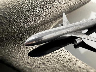 Subcontract Finishing Services 3d polished plane imposed against before image of rough surface