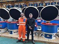 Guy martin standing next to Adam