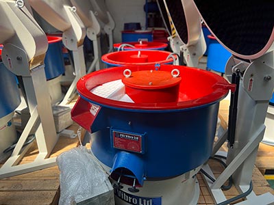 The Monday Morning & Friday Afternoon Issue a row of vibratory finishing machines