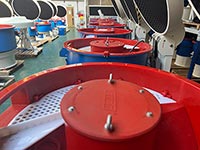 vibratory machines lined up in the factory